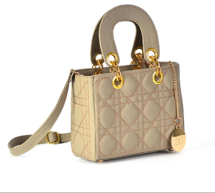 Designer Leather Handbag with a Secure Top Handle & Elegant Long Strap