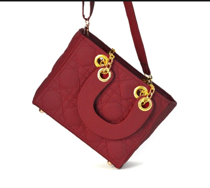 Designer Leather Handbag with a Secure Top Handle & Elegant Long Strap